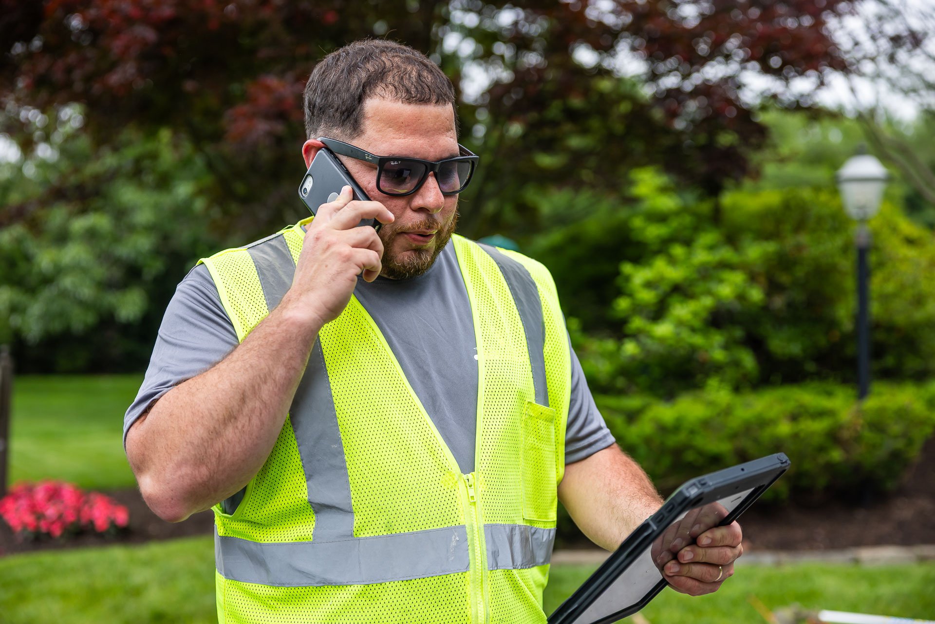 designer assessing a landscape project site