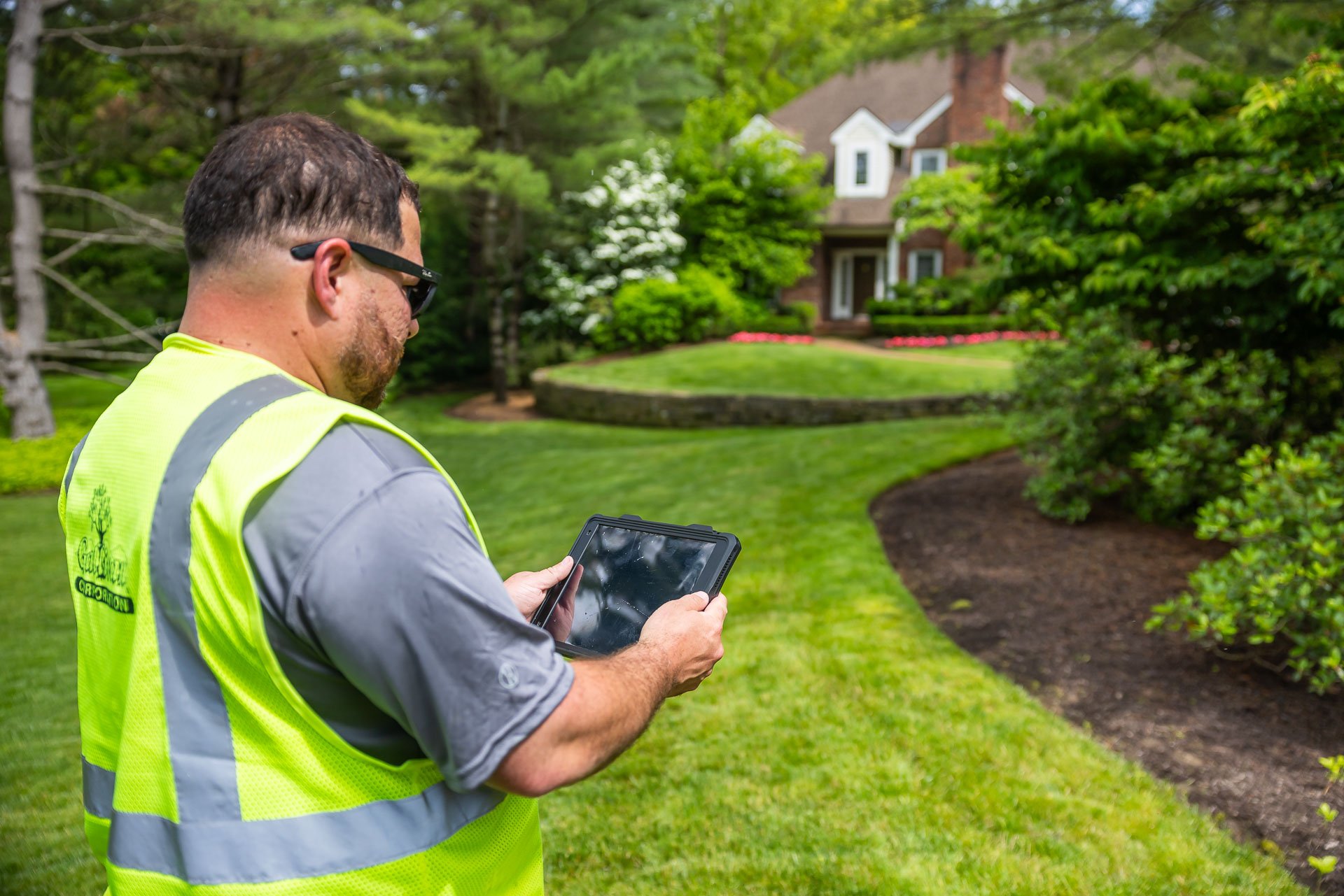pool designer evaluating site conditions