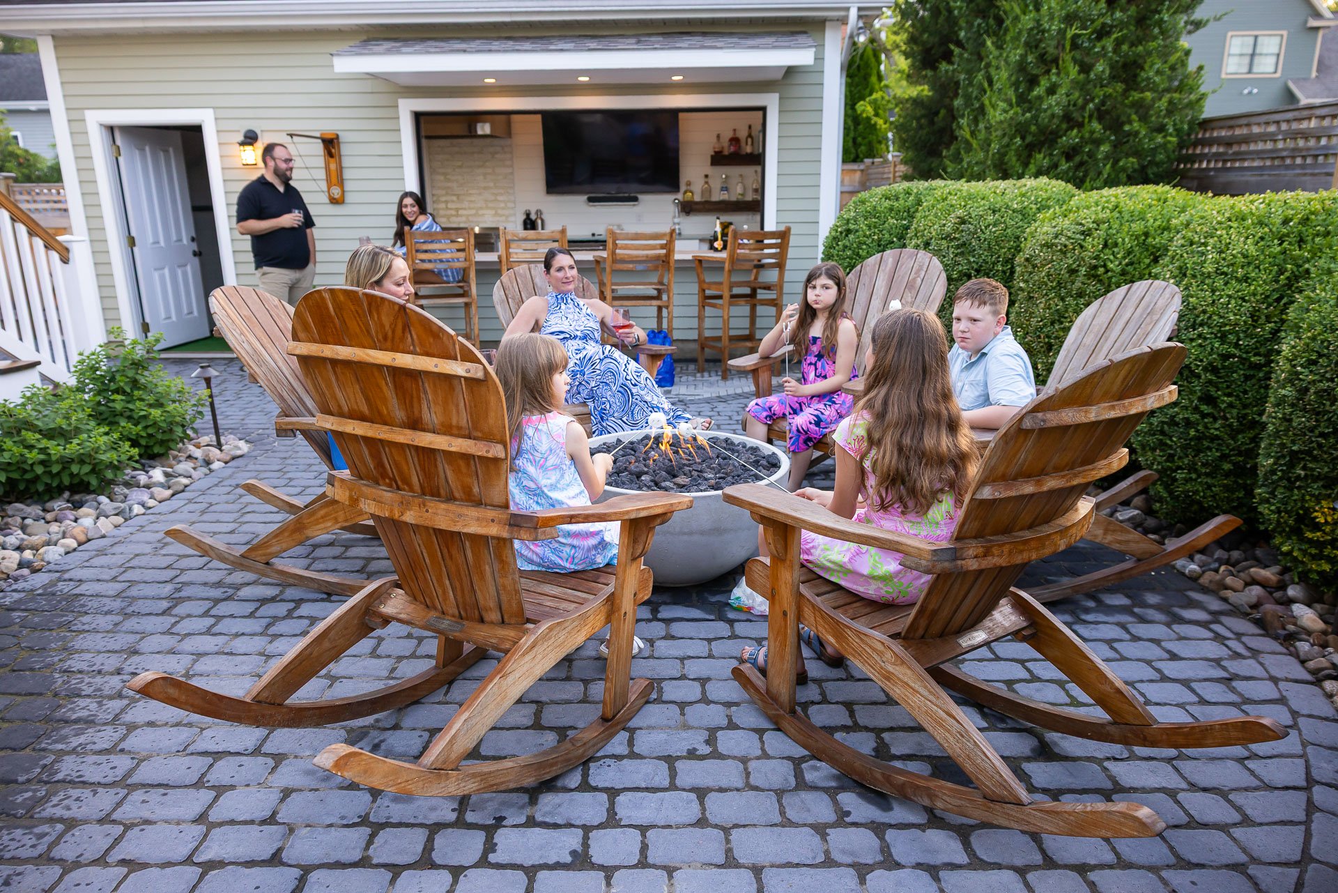 firepit close to an outdoor bar structure