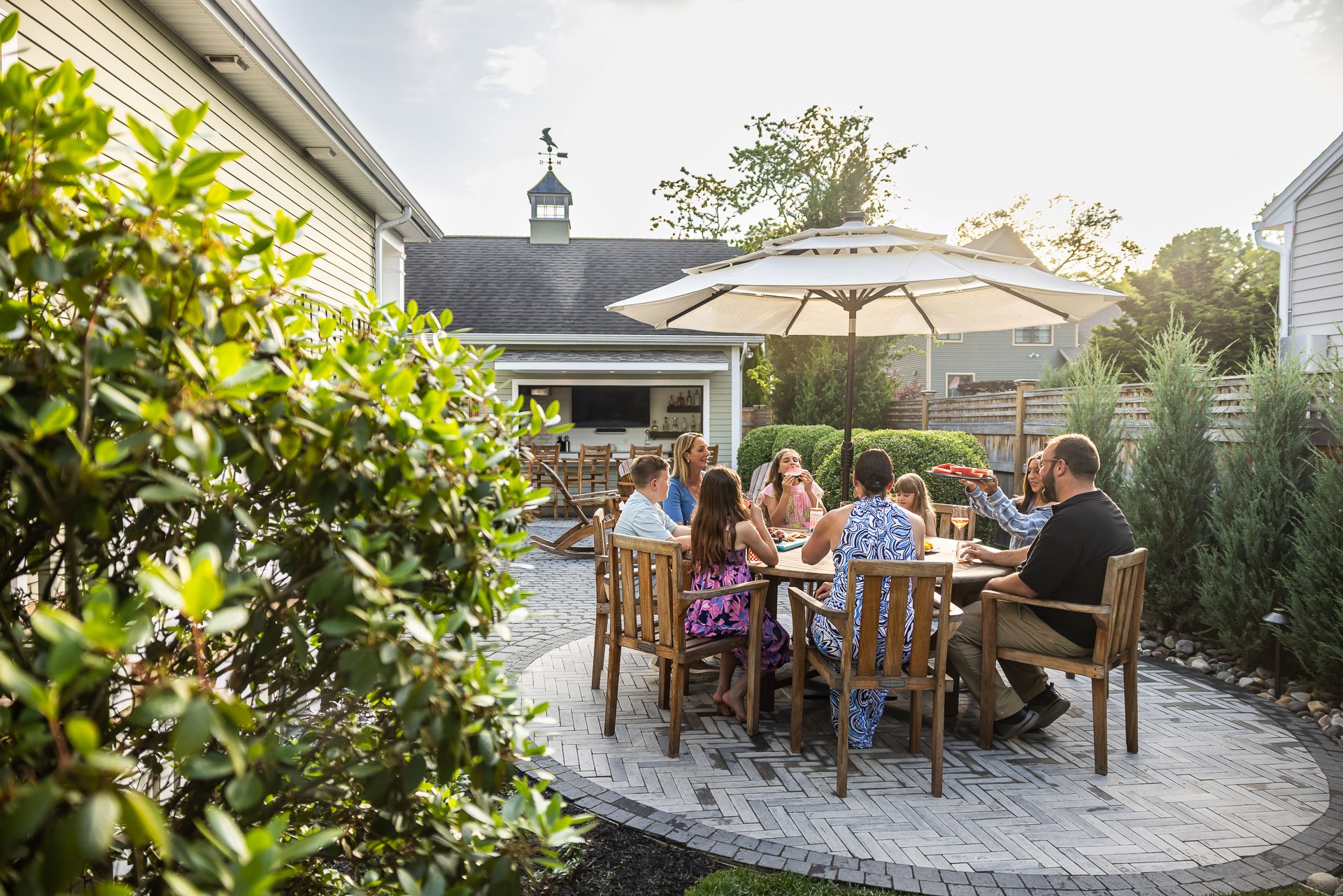 family enjoying their outdoor landscape