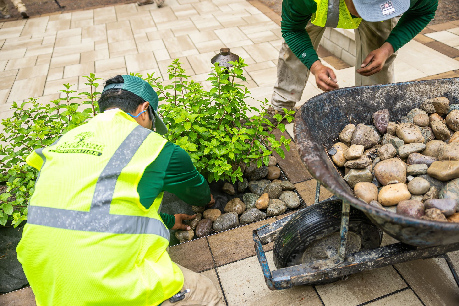 hardscape elements being installed with care by hand