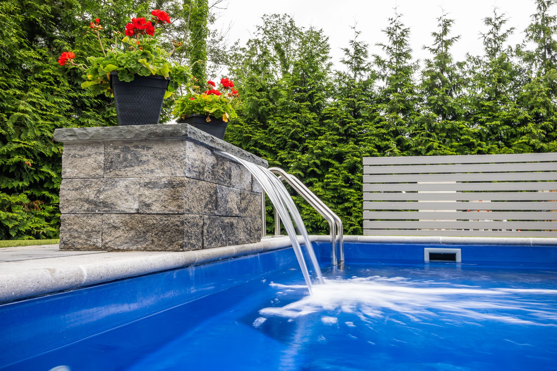 pool with fountain and equipment screening