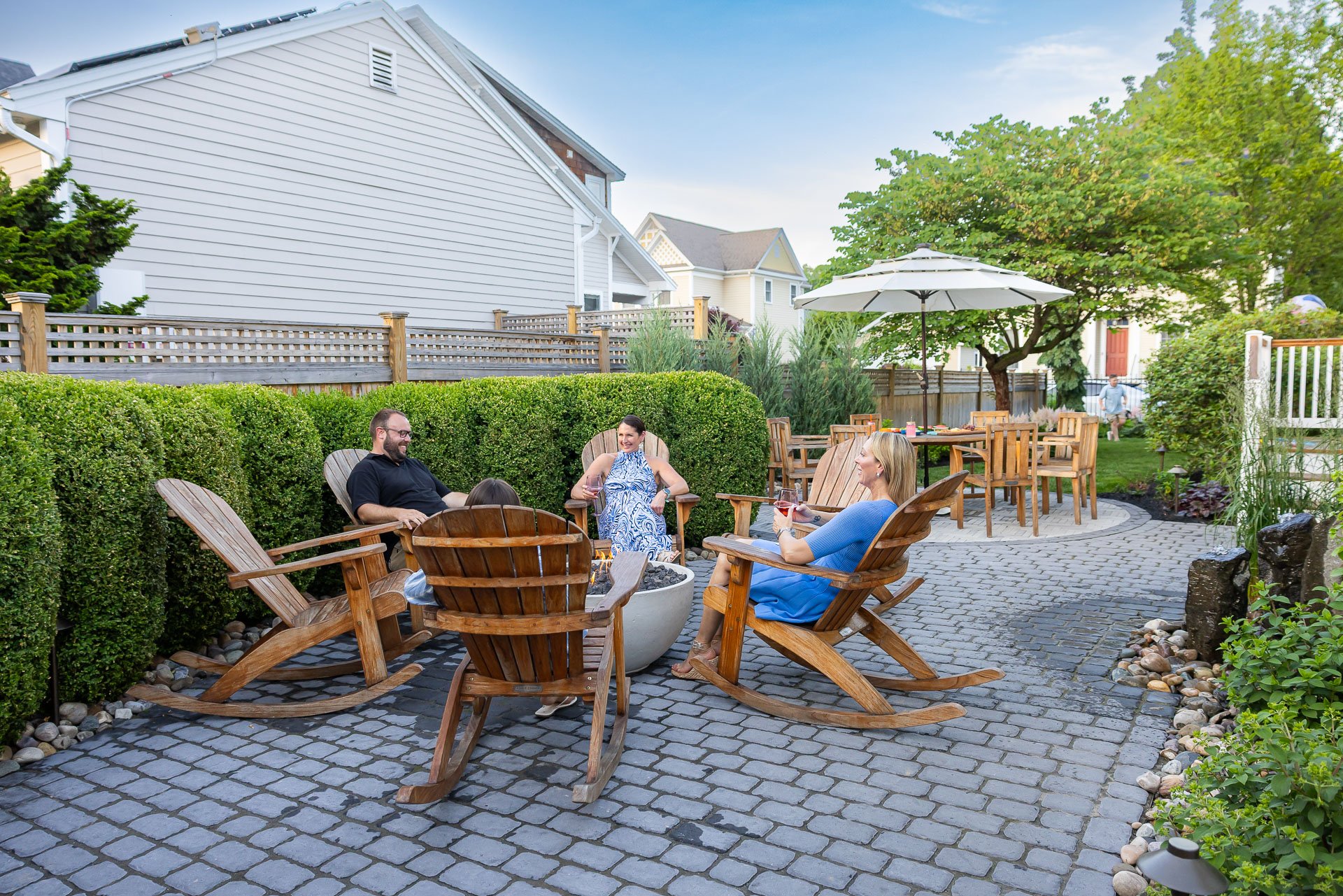 upstate ny homeowners enjoying hardscape patio