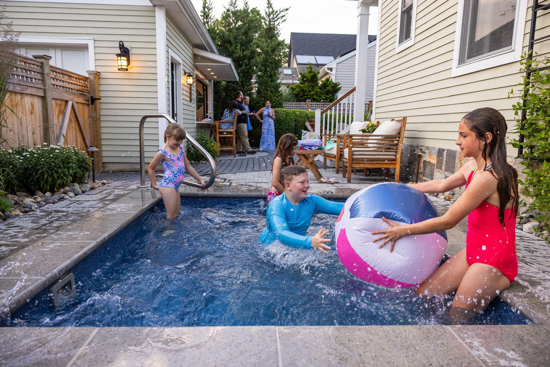 children playing in a pool