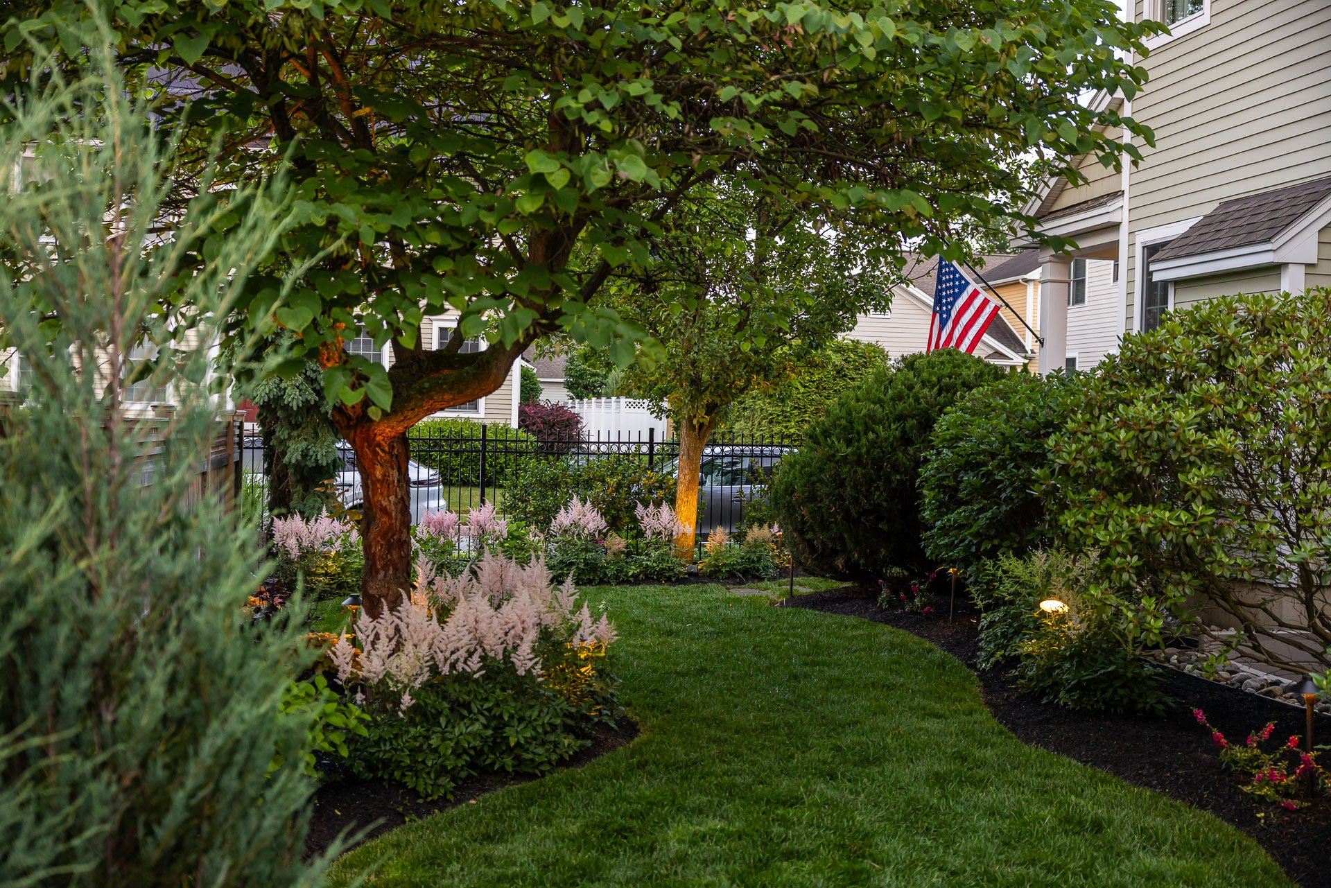 landscape lighting planting beds spotlight path flowers