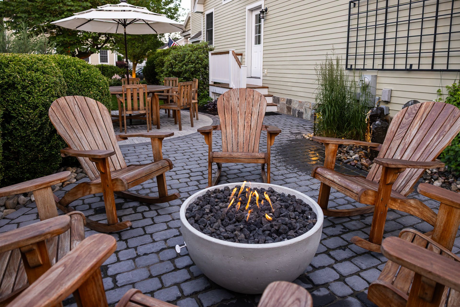 outdoor living space with a patio and firepit
