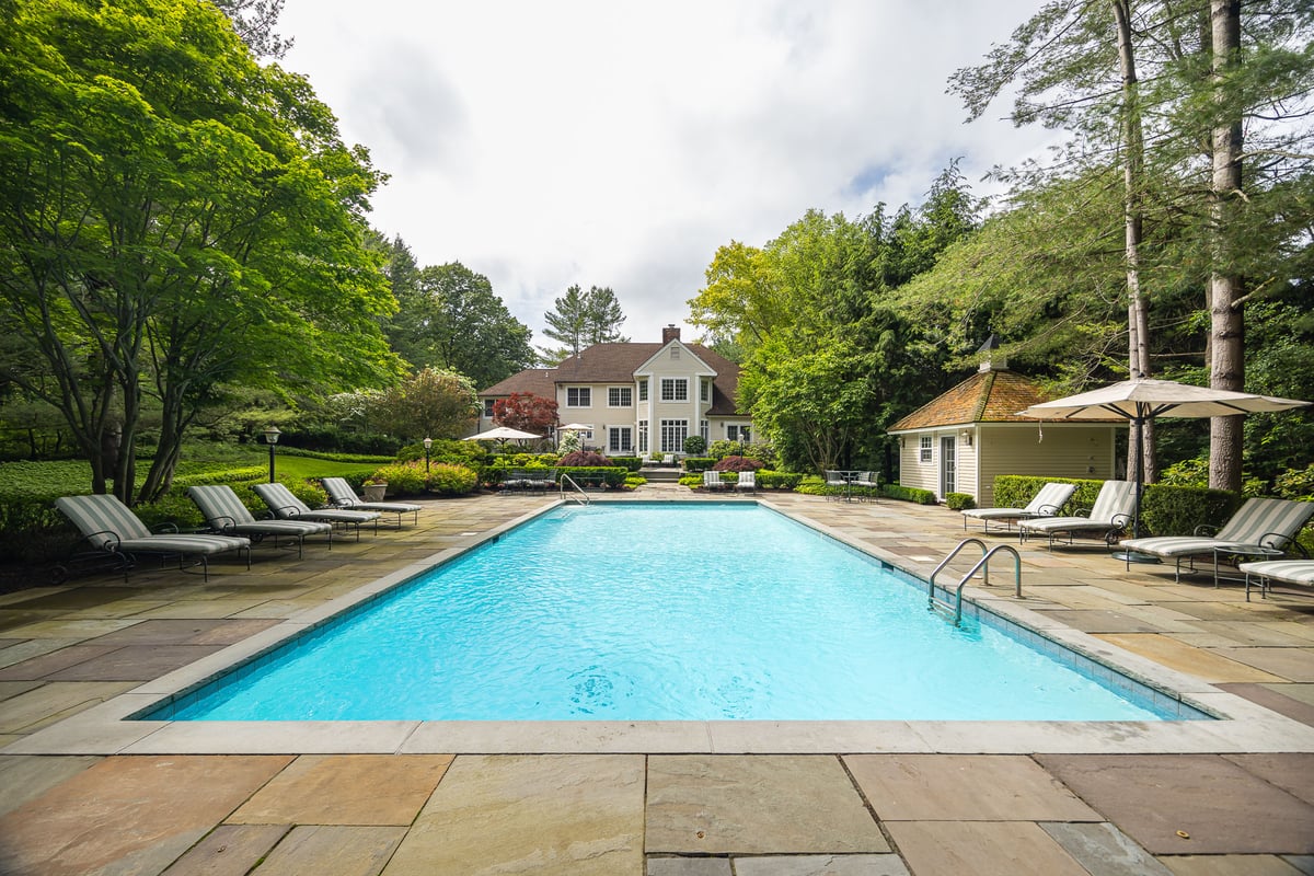 finished pool and patio looking at the home
