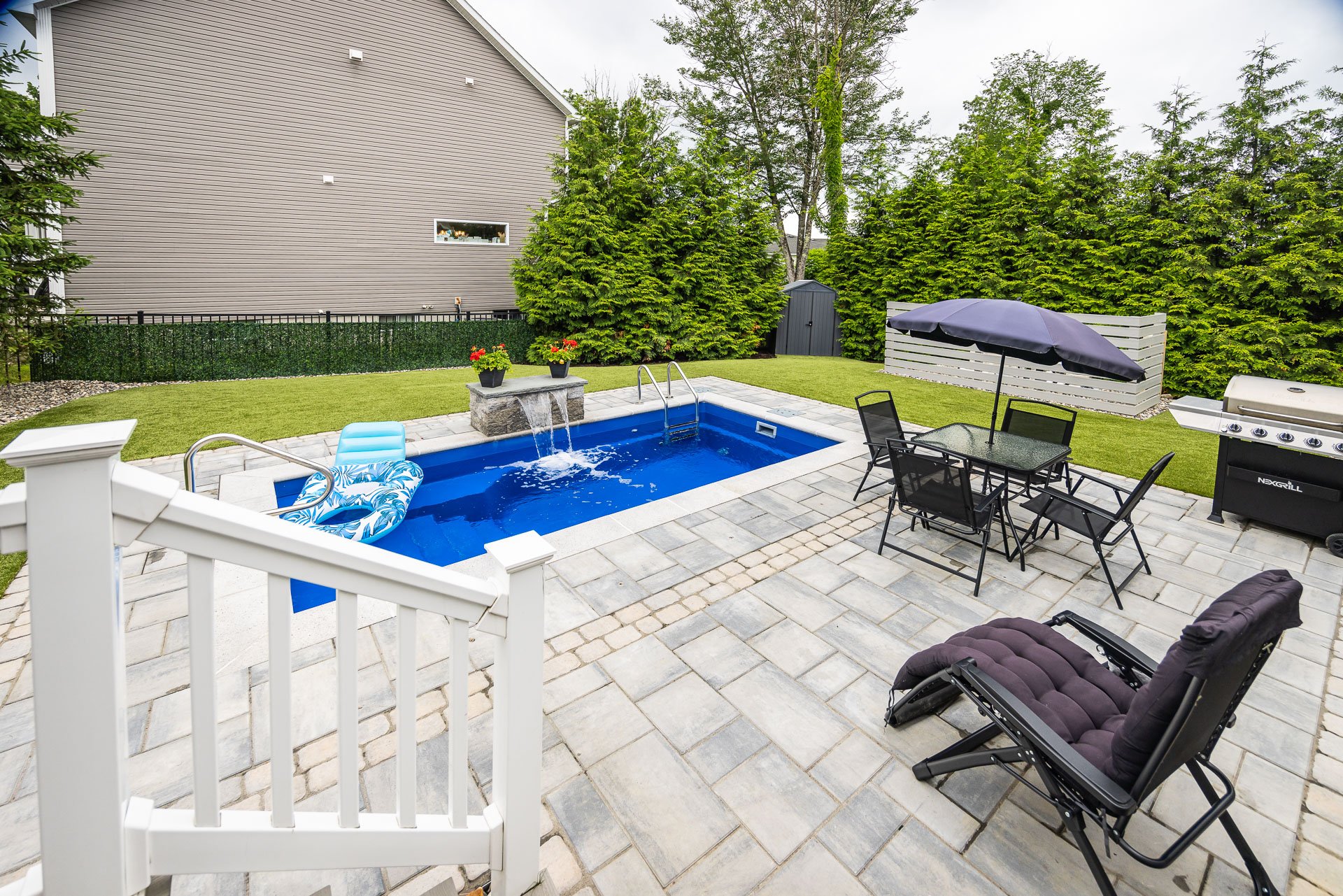 plunge pools can still incorporate water features like scuppers