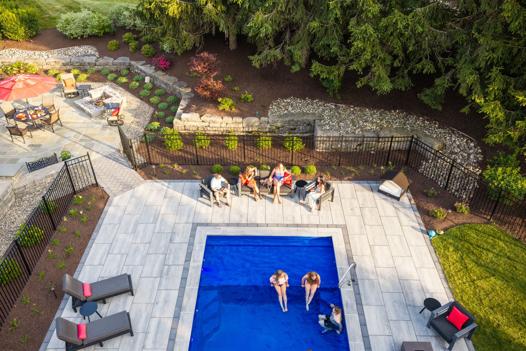 socialize and play on land or in the pool with a tanning ledge