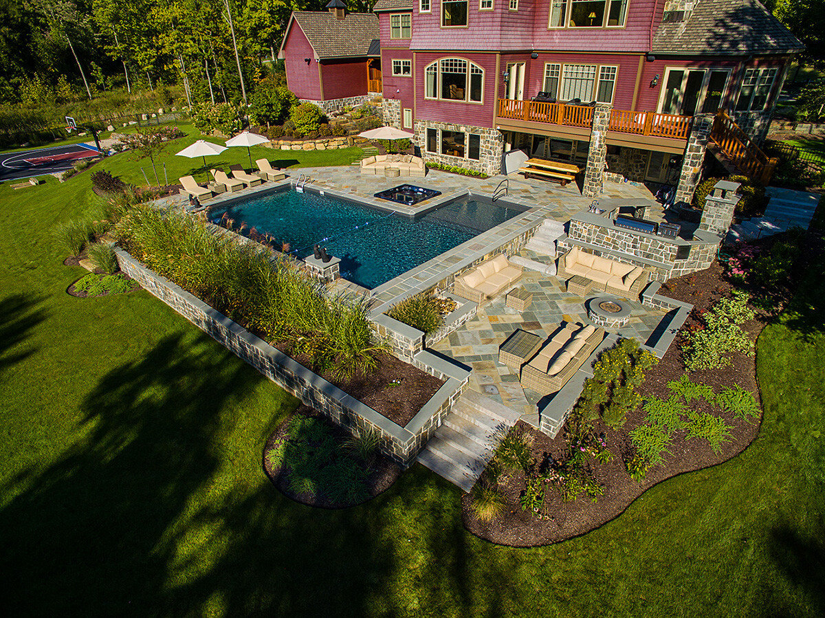 pool with a spa and scuppers