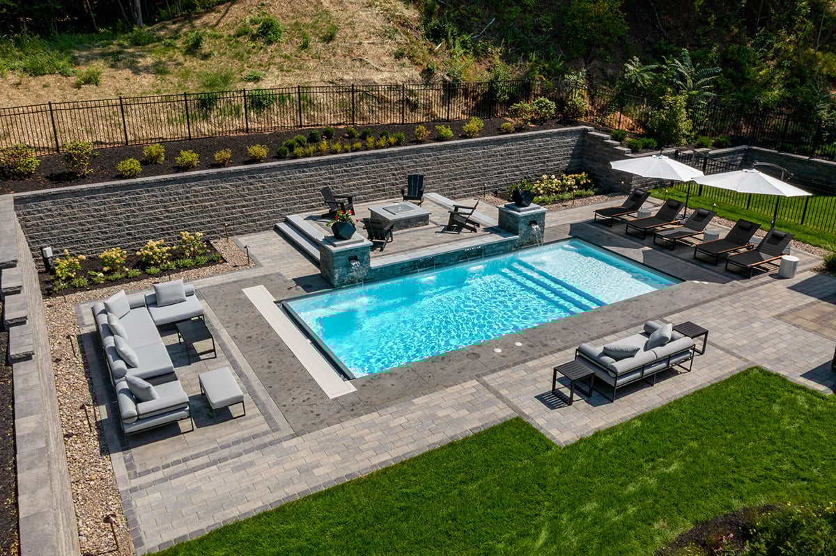 retention walls carve out space for features that otherwise could not be built on sloped landscapes