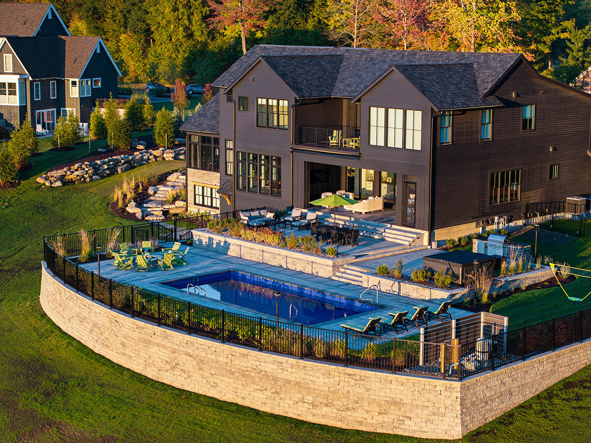 aerial wall pool fence planting bed home seating patio hot tub grass mangini