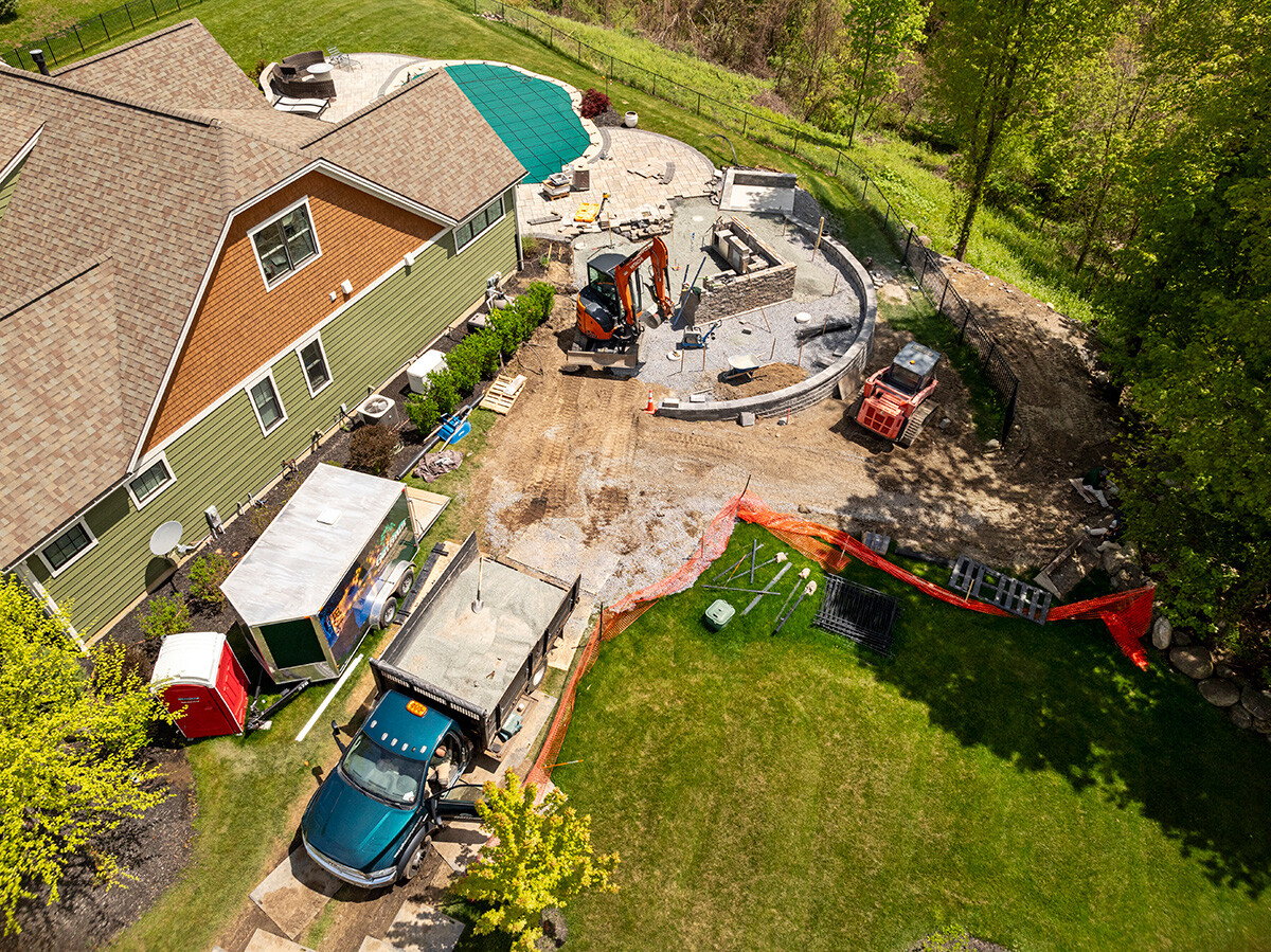 construction work being done in part to backfill a pool area