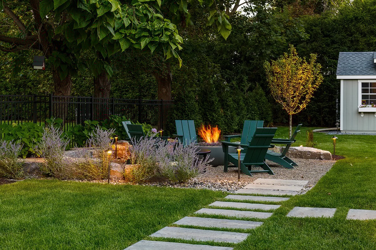 chairs gathered around a natural gas firepit