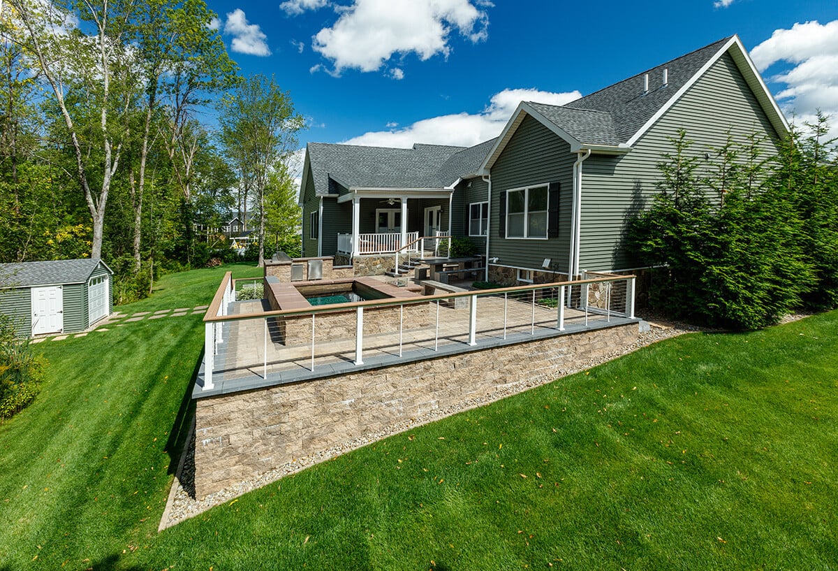 retaining walls are among the features that rewuire technical knowledge to successfully construct