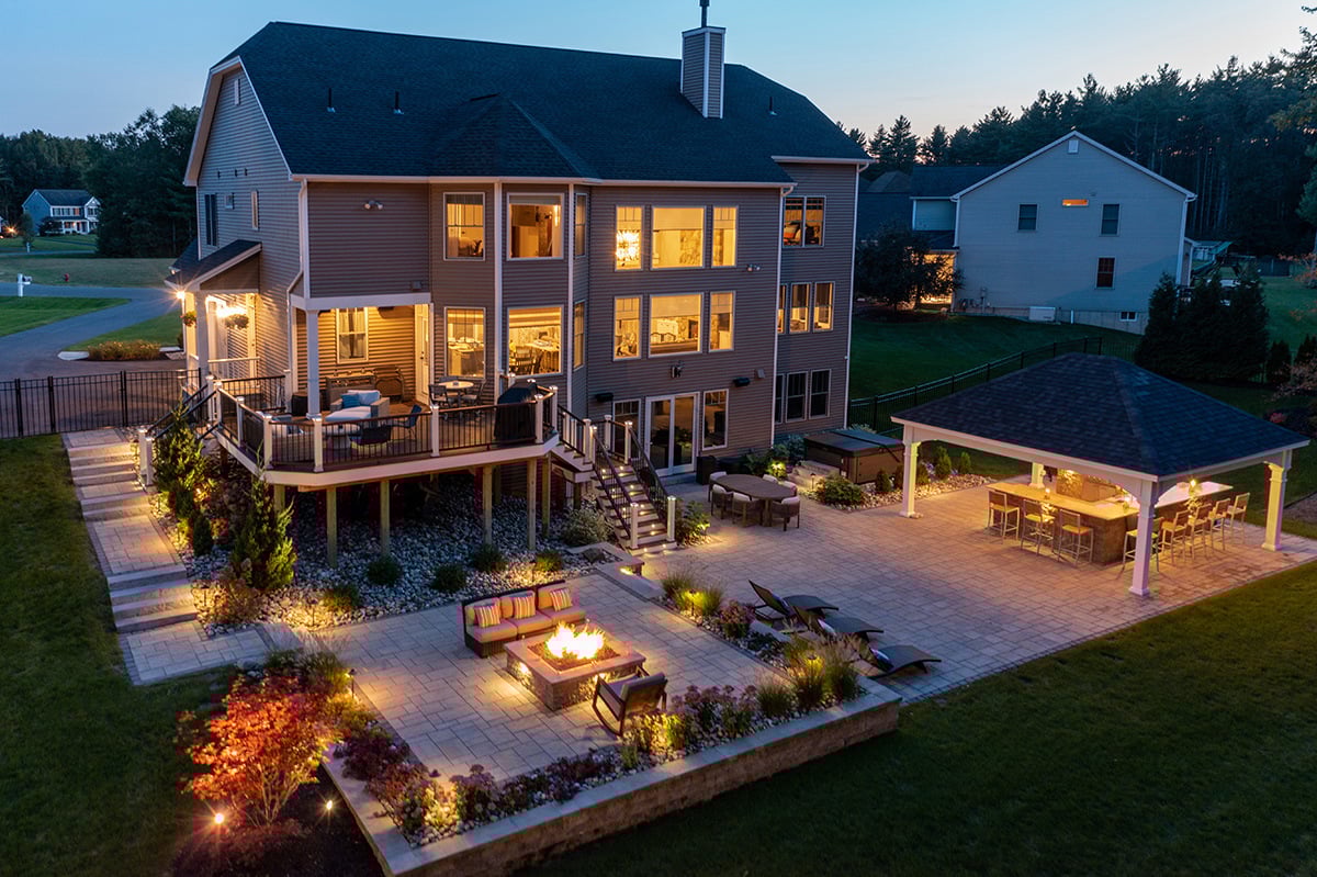 landscape design project that connects the deck of the home to the backyard