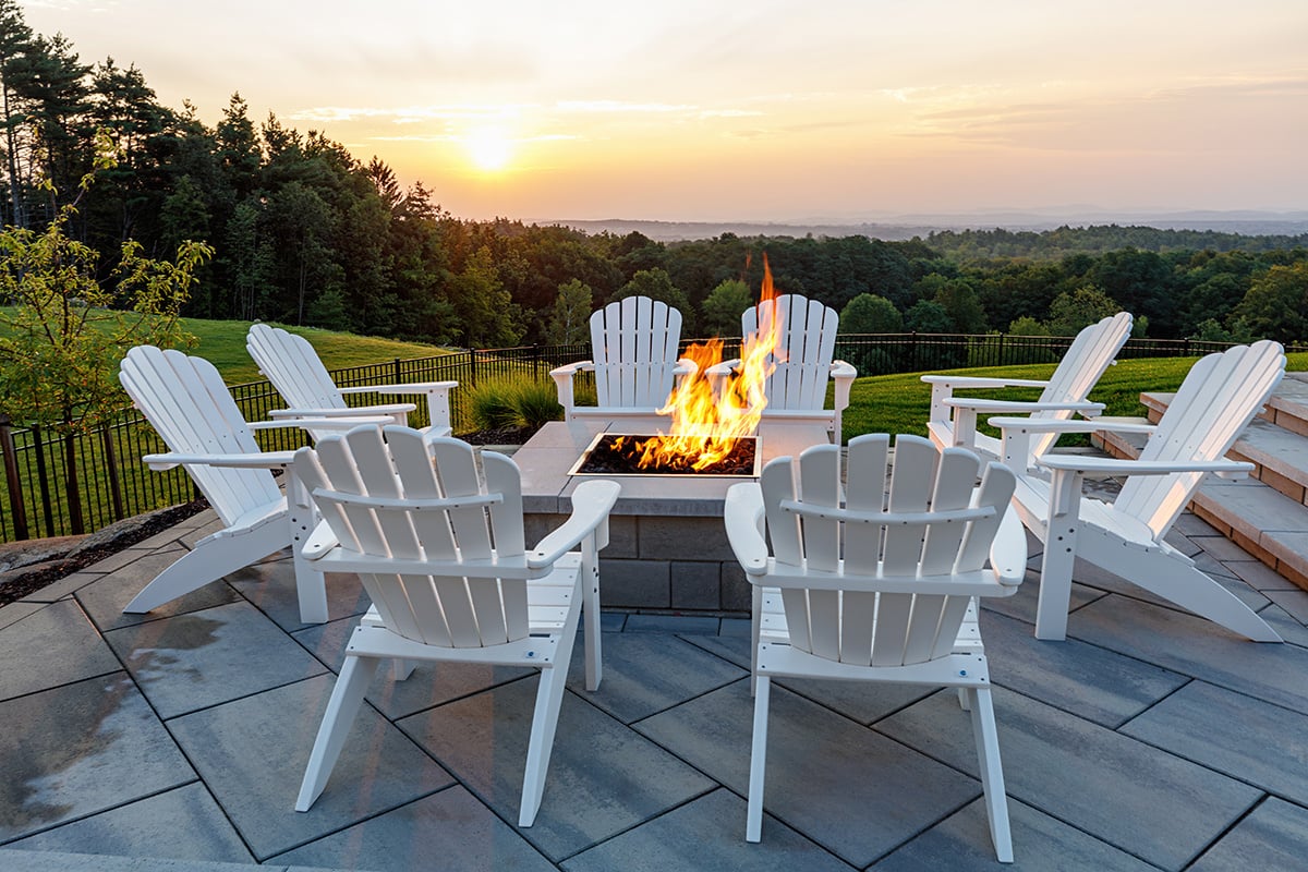 chairs set up around a fire pit