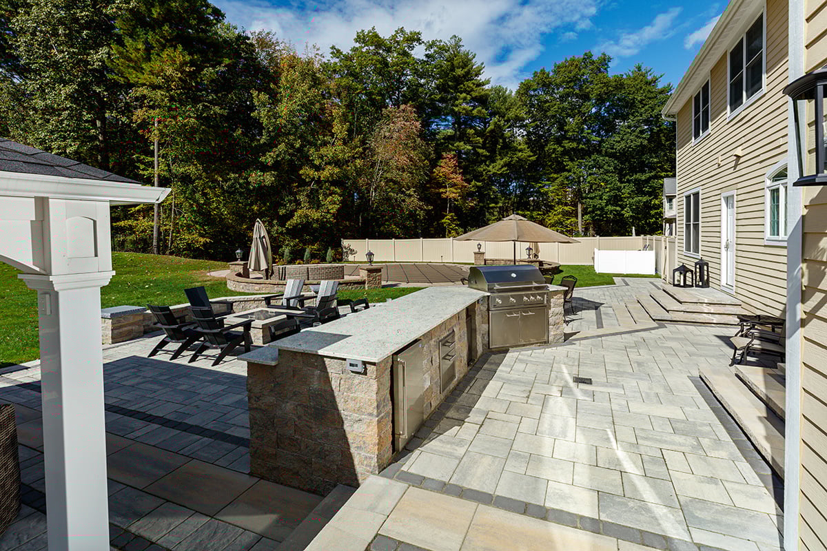 proximity to home entry is key for this outdoor kitchen