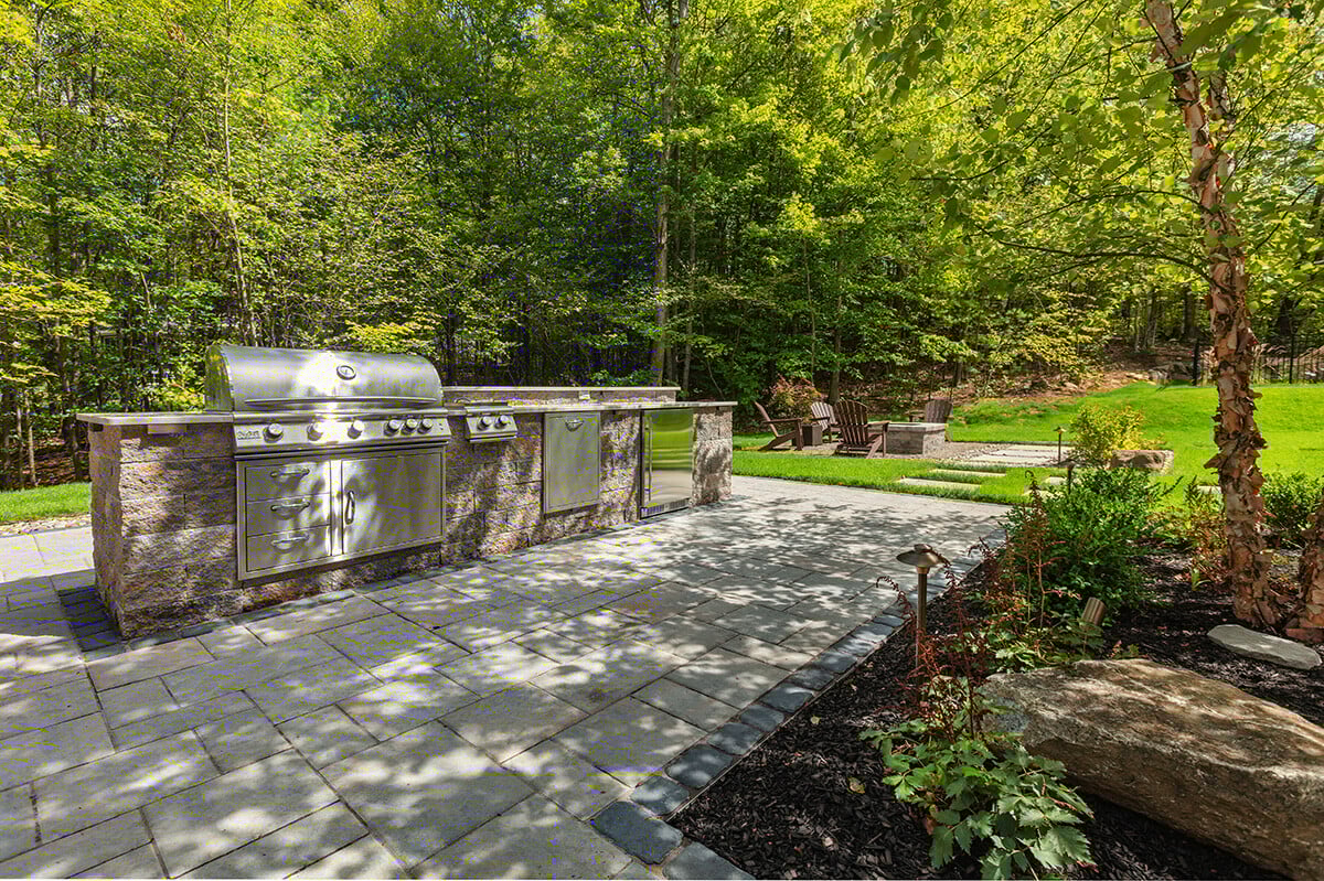outdoor kitchen made with a variety of stone materials
