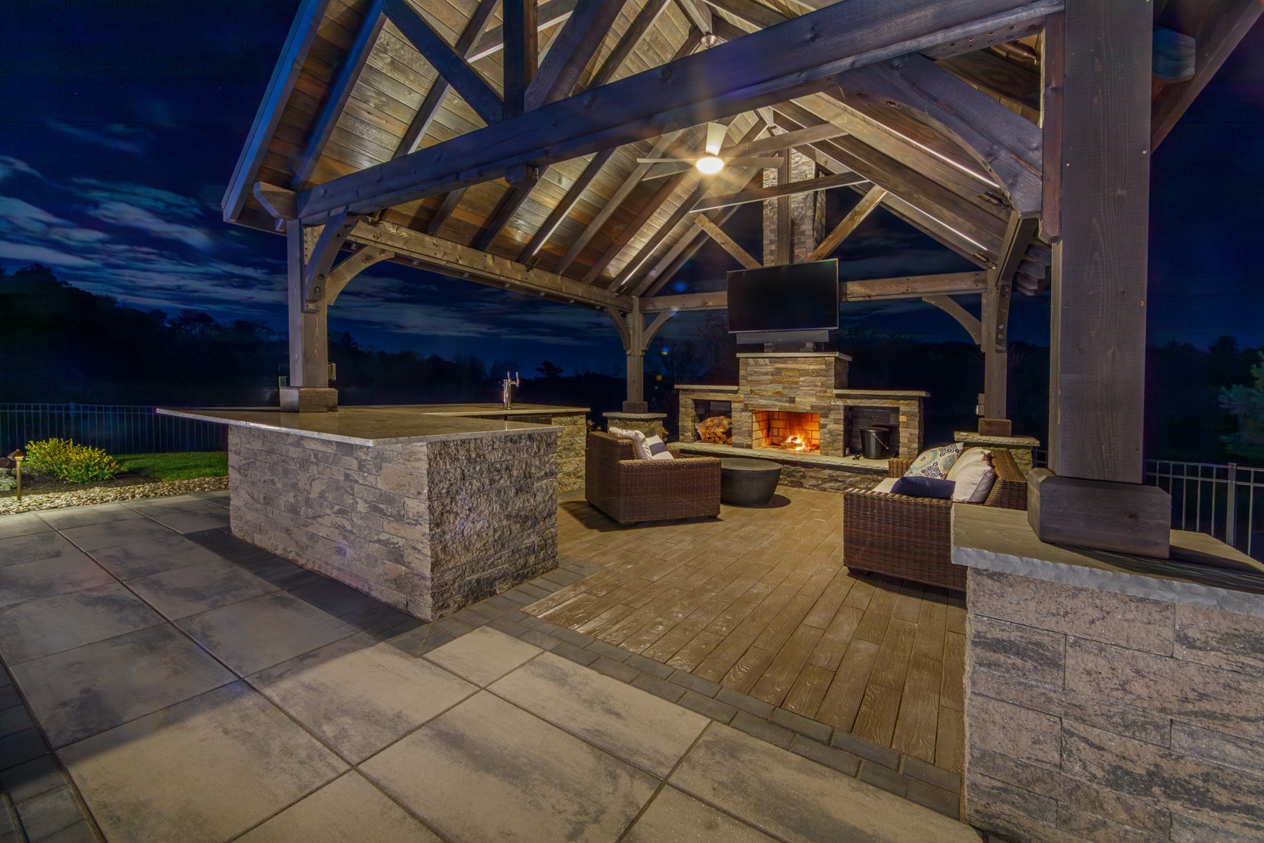 fireplace underneath a pergola