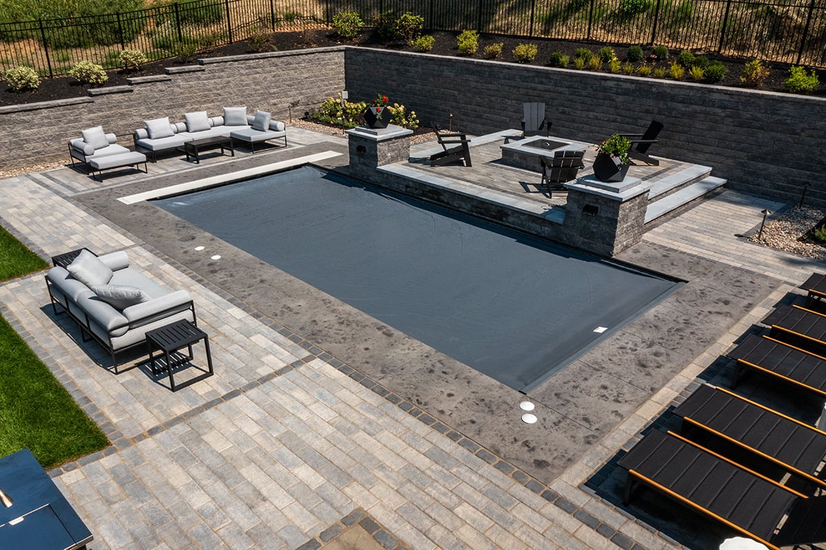 pool covers help keep pools warm and clean