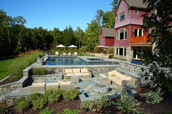 plants surrounding pool exterior