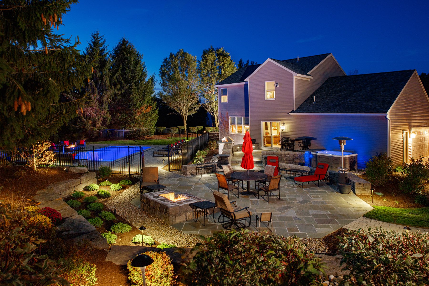 outdoor living space with landscape lighting