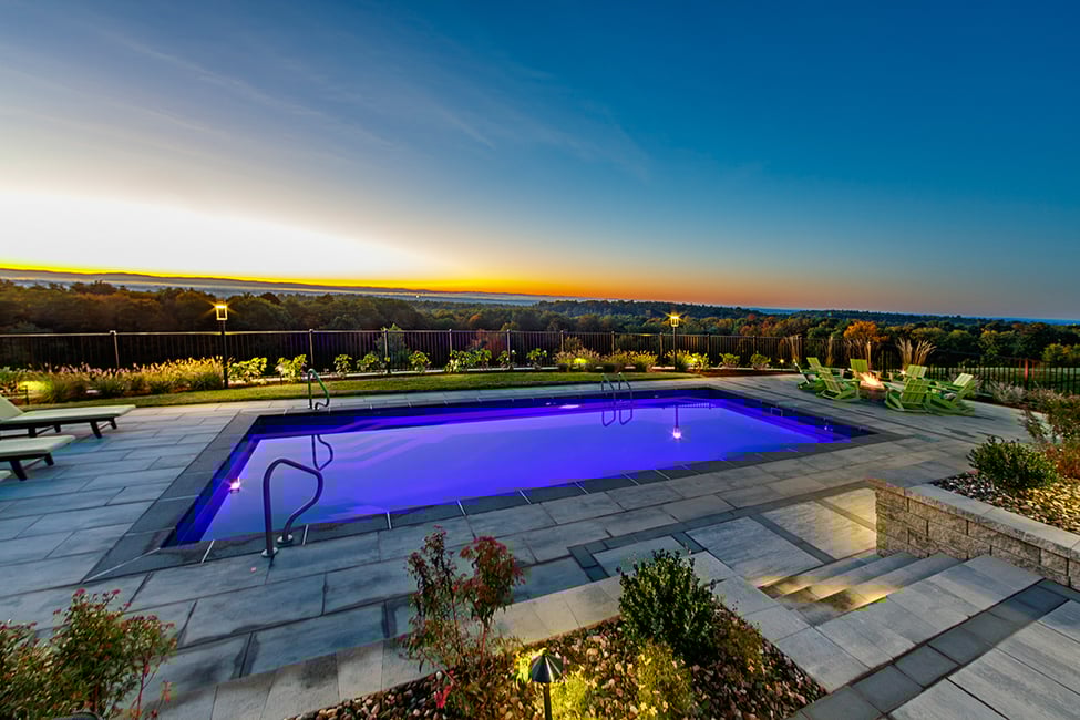 pool patio porcelain chairs fire pit sky mangini