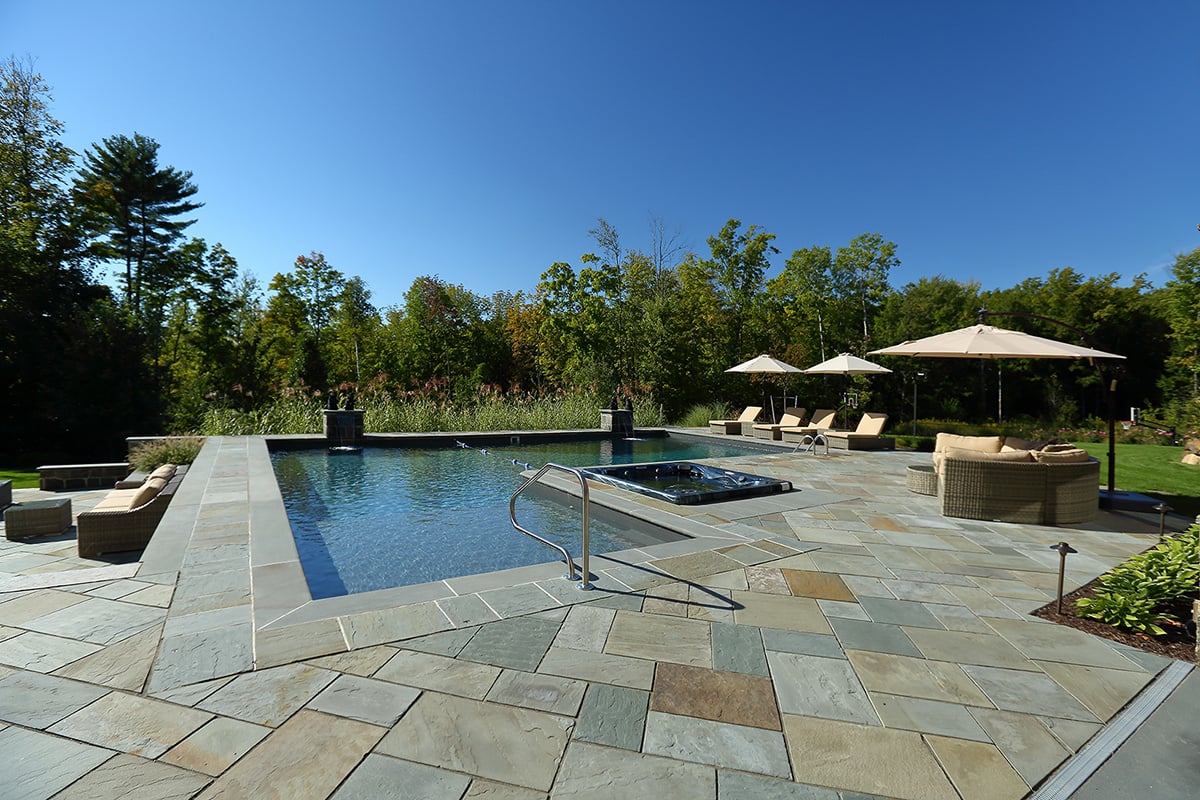 natural stone also does well with wet areas like pool decks