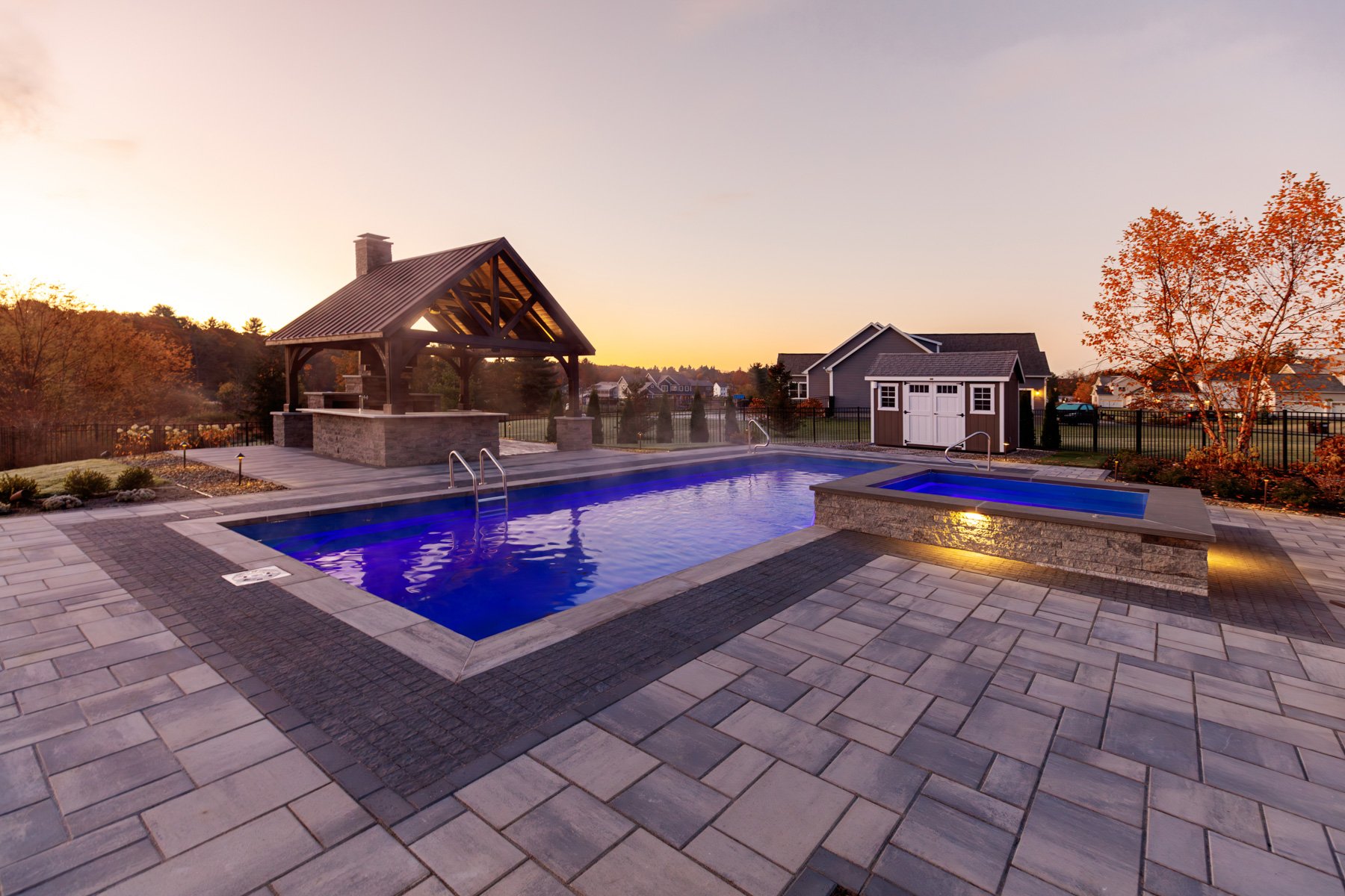 soft lighting at sunset around a pool