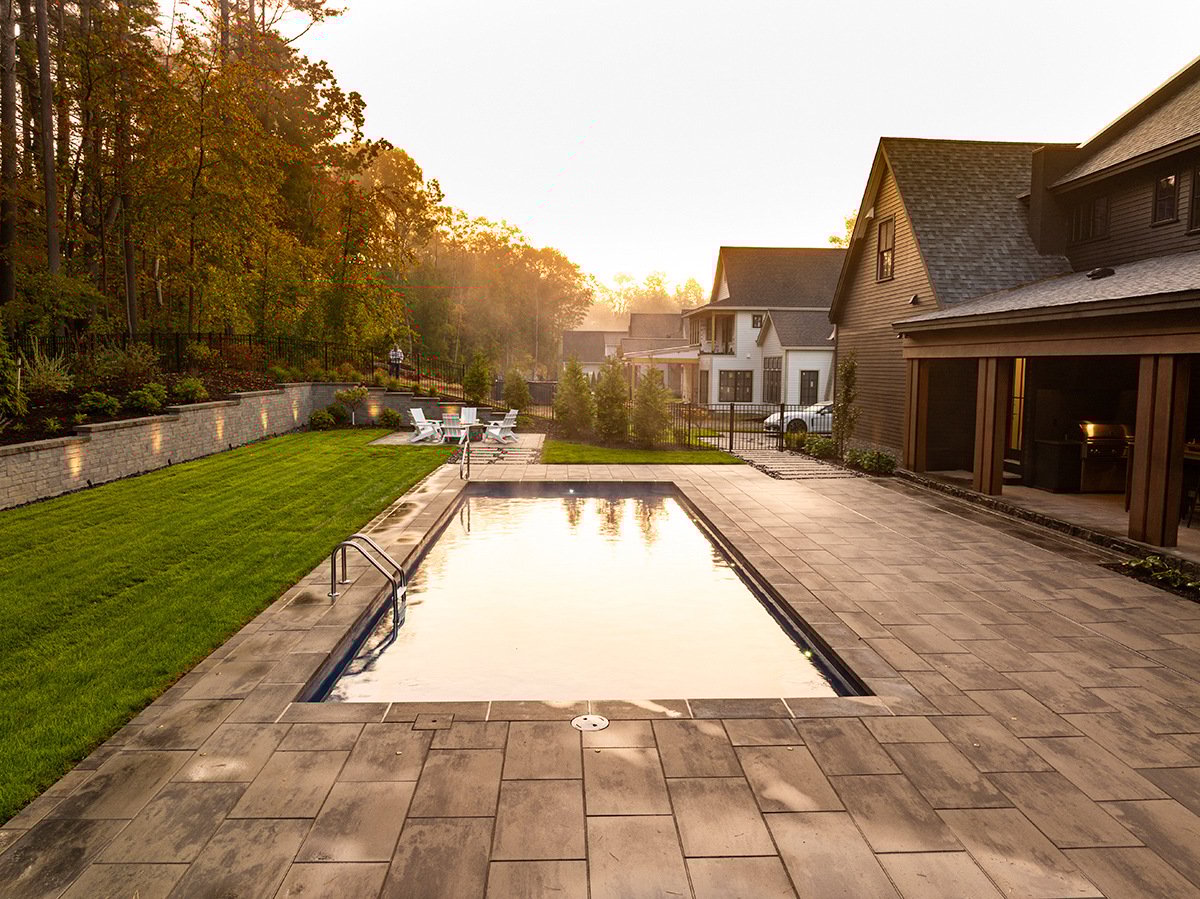 pool sunrise porcelain patio porch grass seating edelman