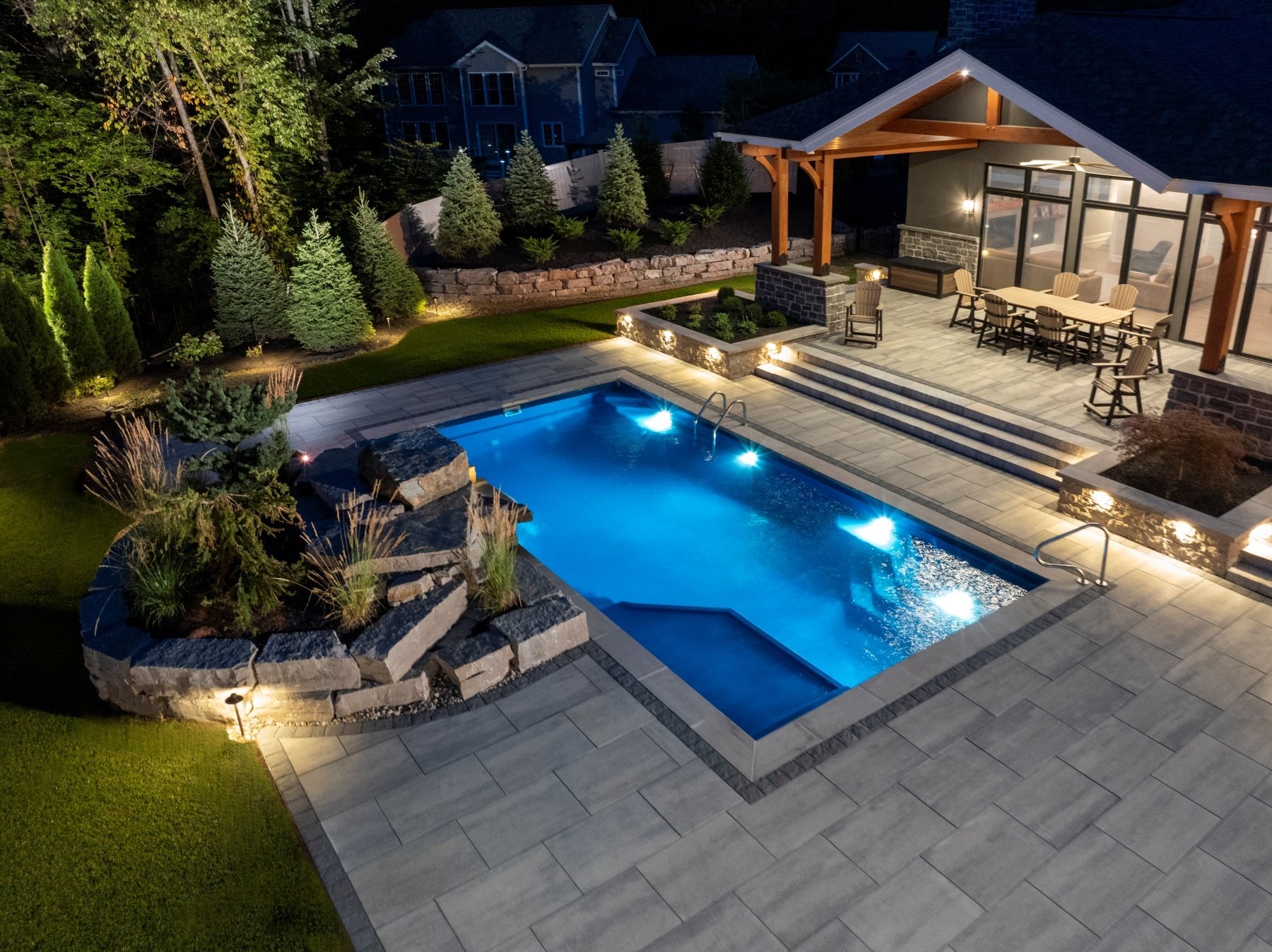 integrating lighting into your pool with a sun ledge