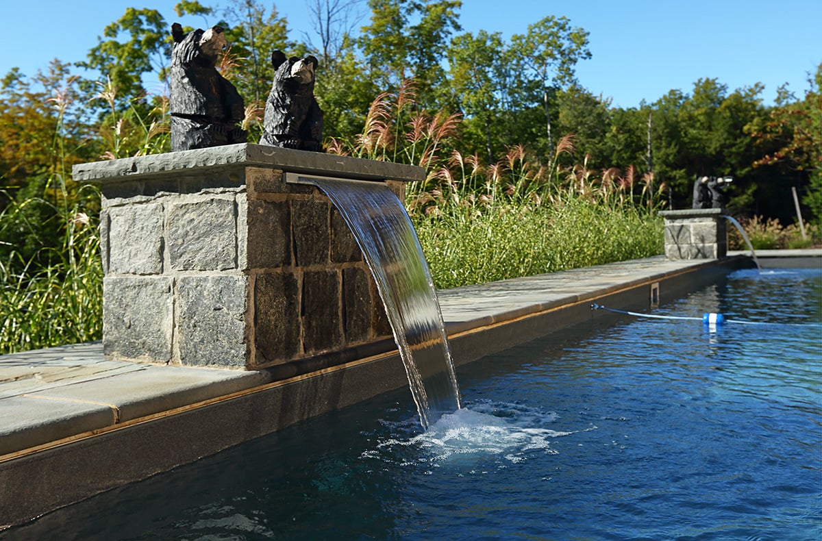 scuppers and other water features can factor into the cost of your pool