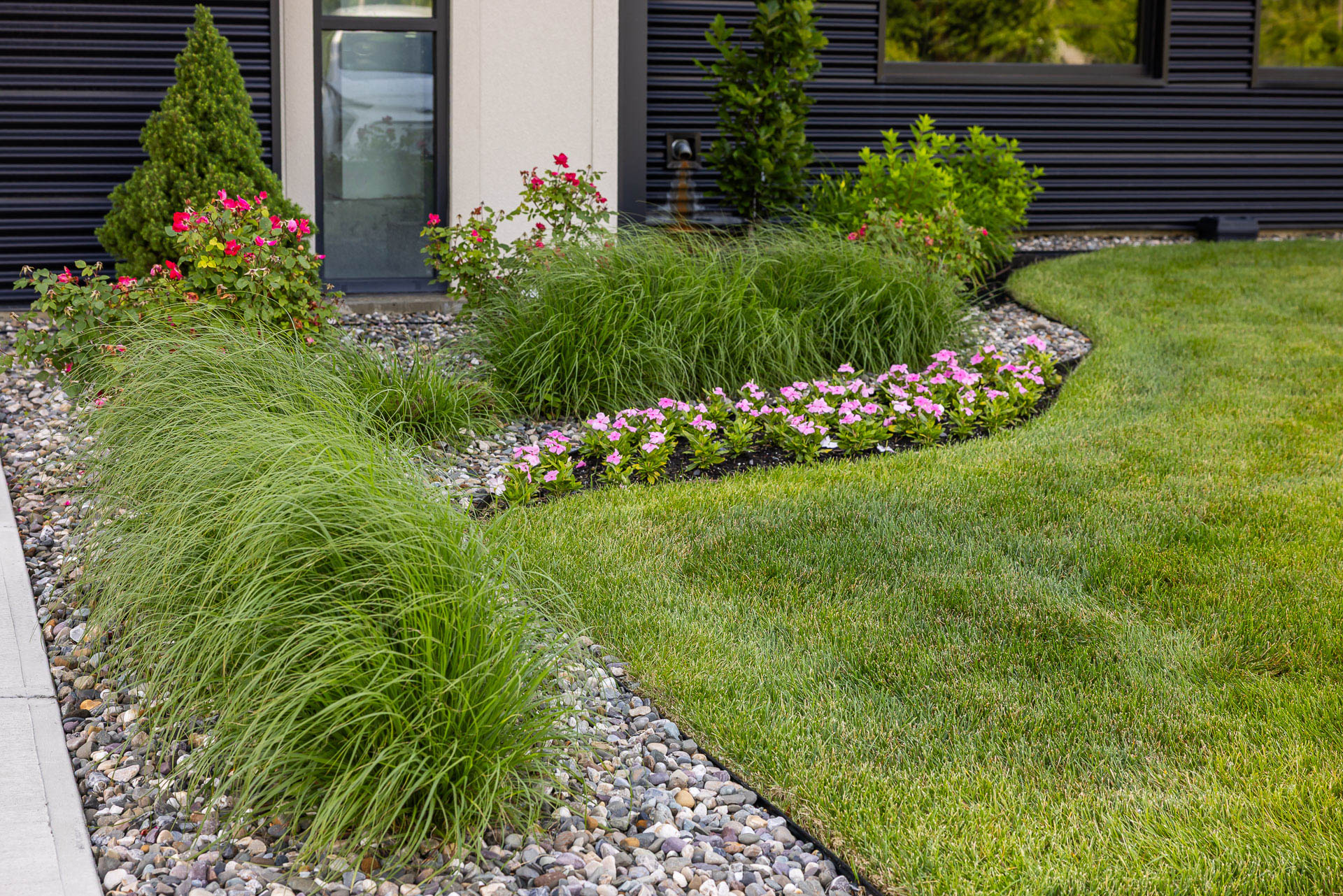detail planting bed gravel flower grass