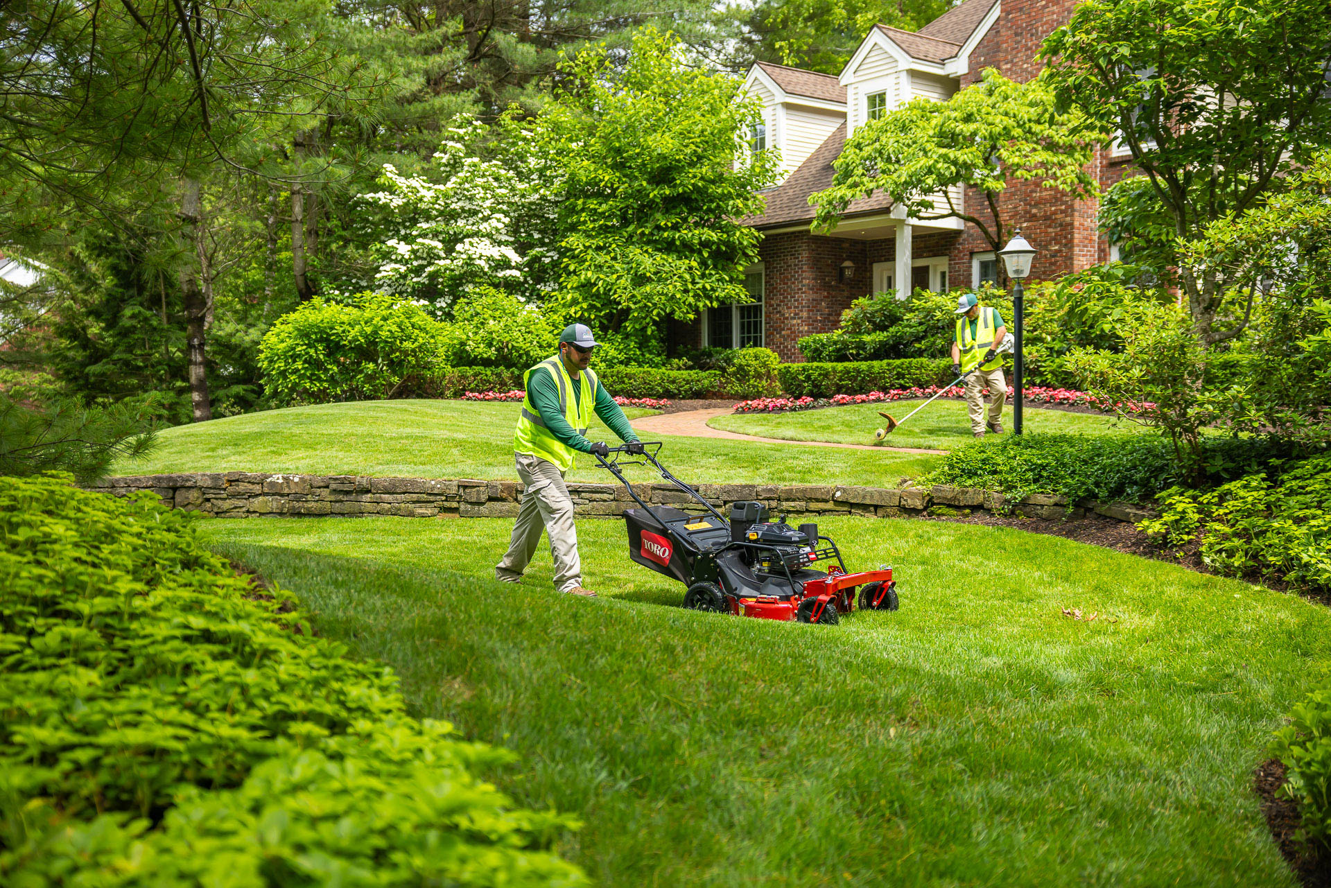 maintenance crew mow line trim grass home 2