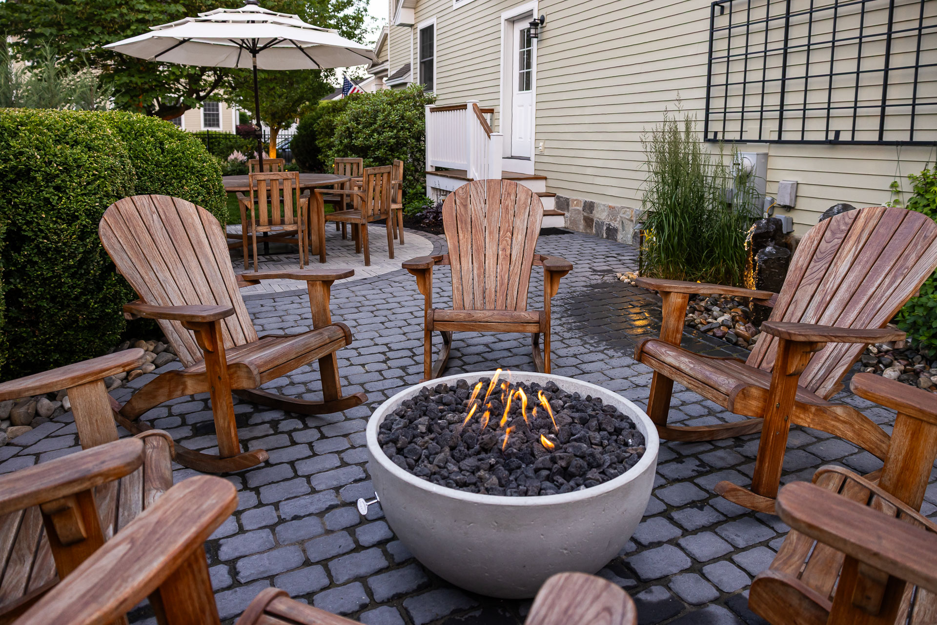 nice chairs firepit paver patio