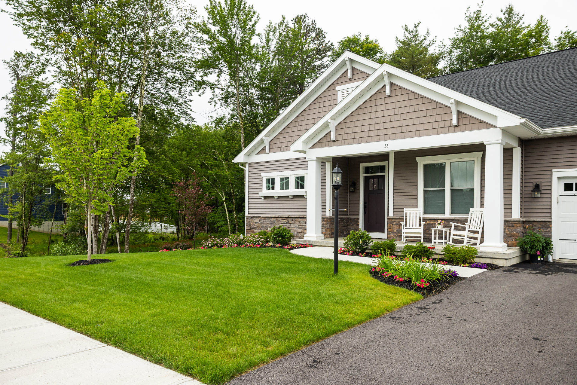 nice home green grass flowers planting bed mulch 2