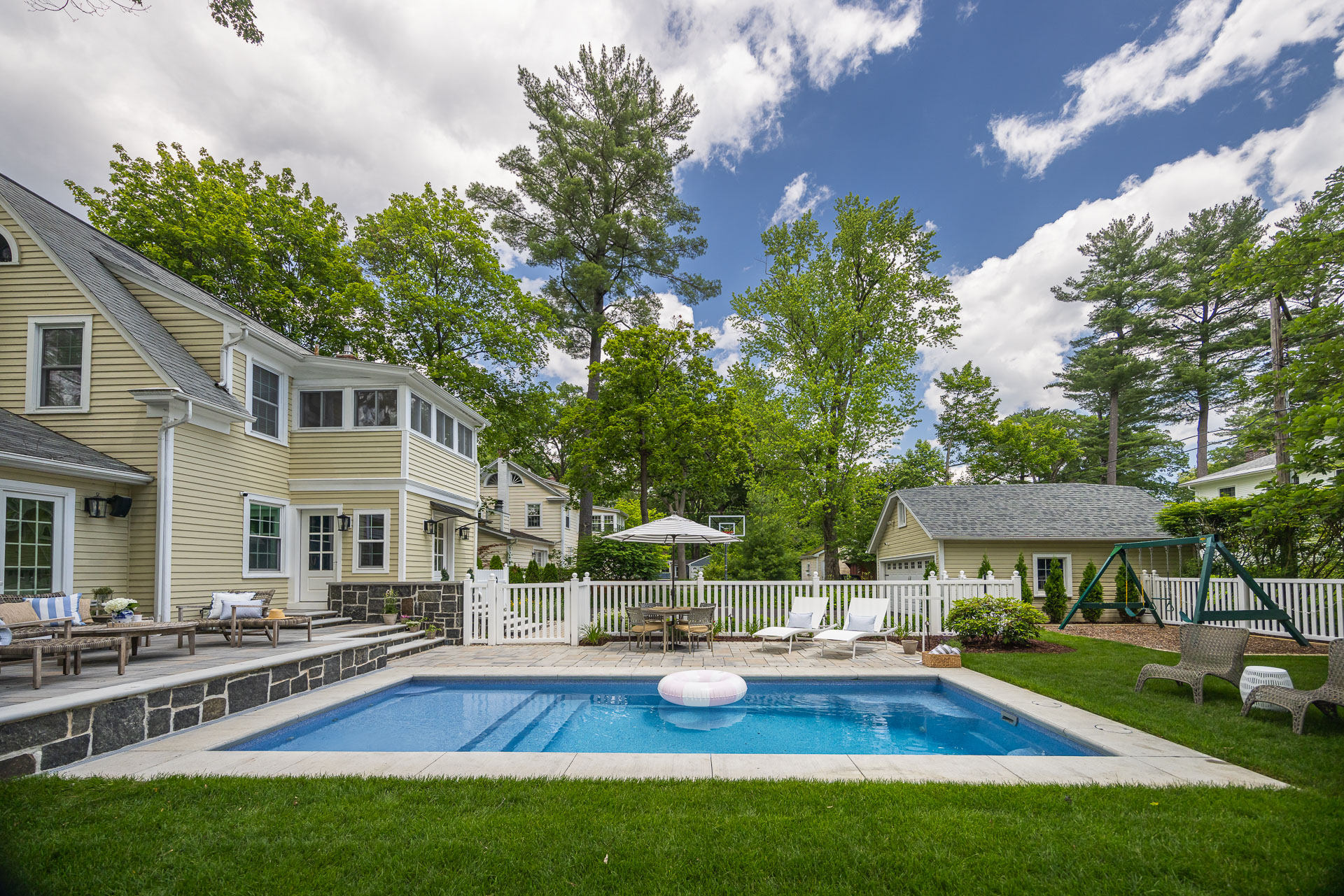 pool grass patio seating stone work steps