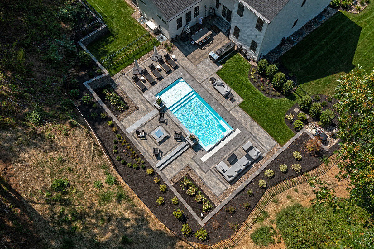 aerial patio pool planting bed seating grass raval
