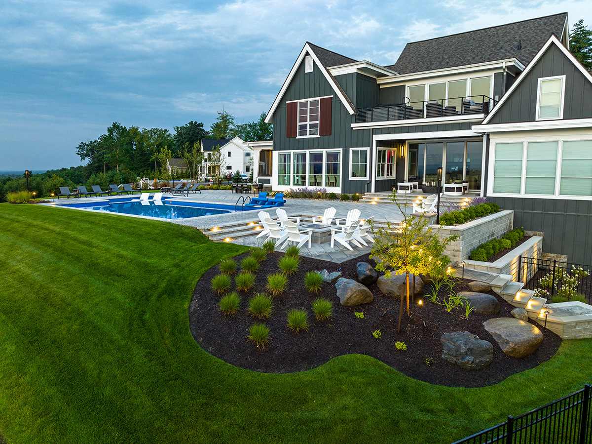 home planting beds lighting pool patio seating walls boulders shrubs trees ohannlon