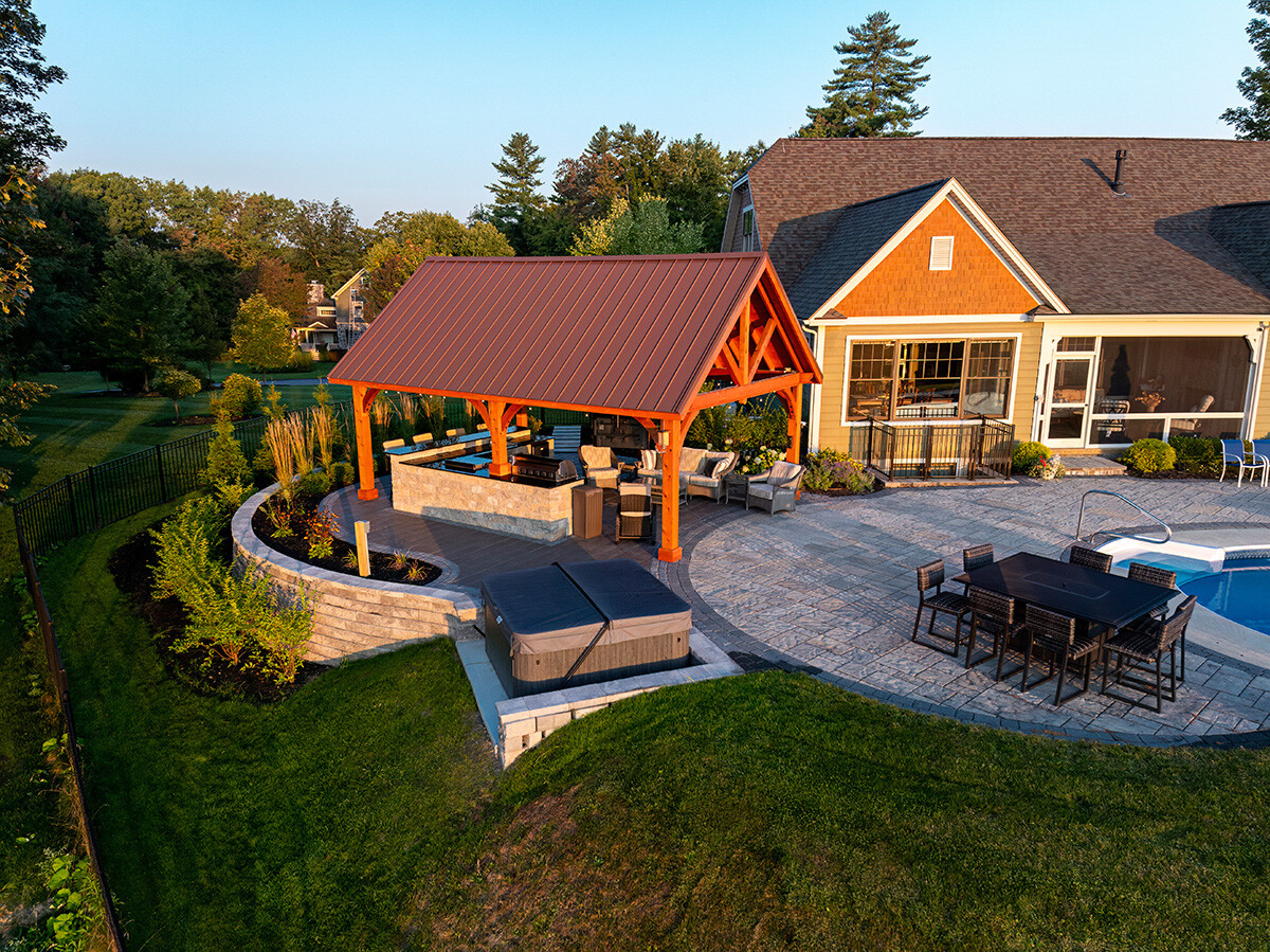 rexford pergola and pool patio with retaining wall