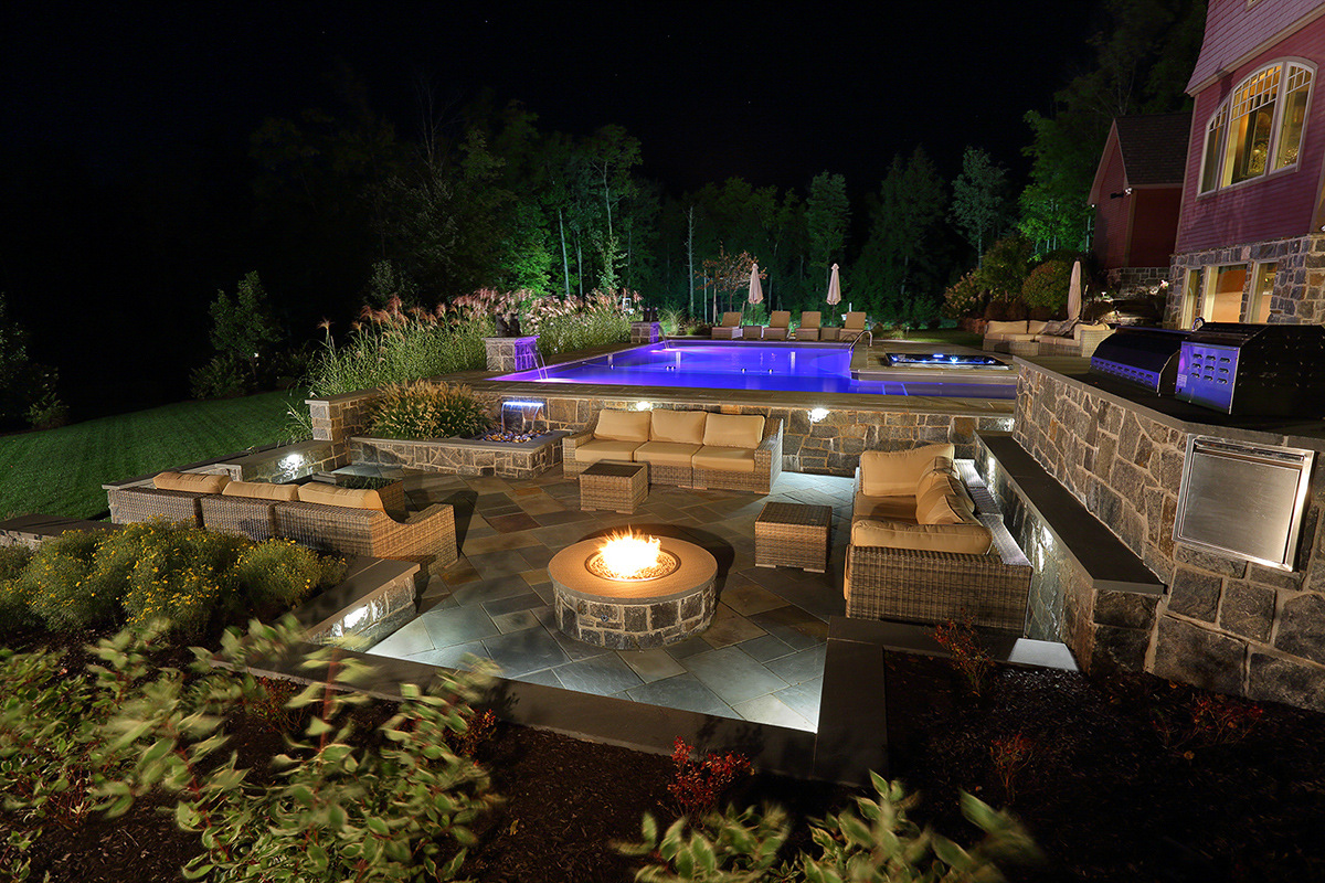 seating patio fire pit stone pool rose