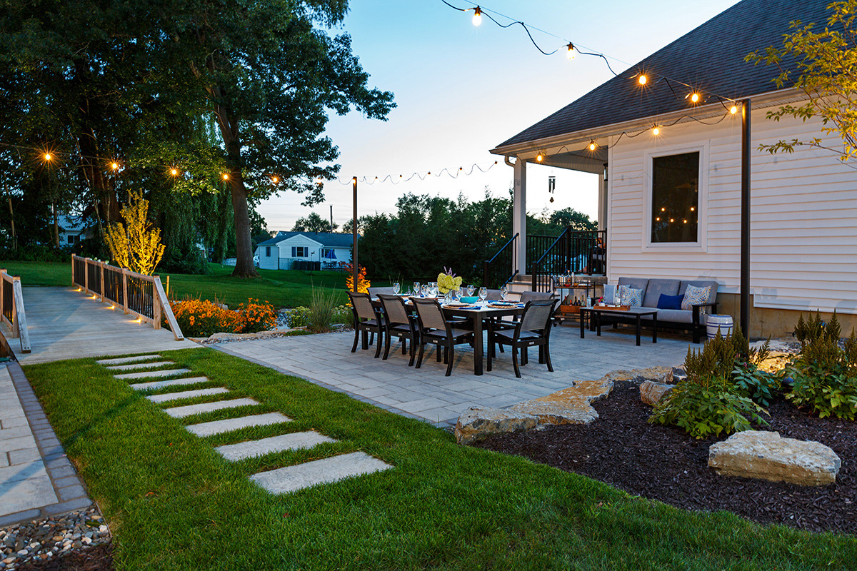 steppers seating bistro lights bridge patio mulch plant beds home vandervolgen