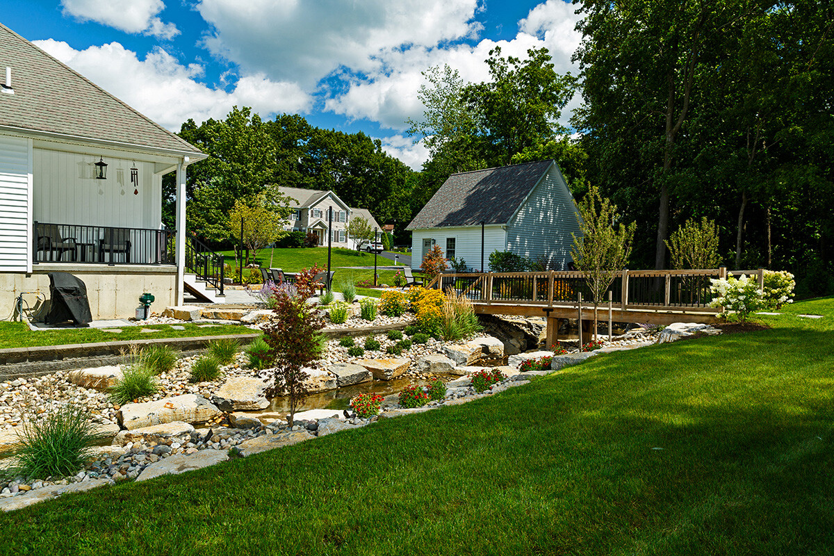 stone water feature home gravel plants bridge vandervolgen
